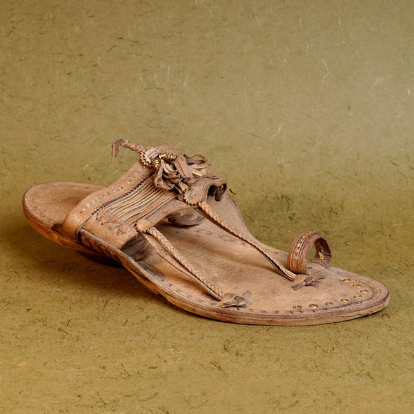 Angled GI Sound Kolhapuri leather chappal for men cross profile, premium vegetable-tanned artisan-braided heritage rugged everyday footwear.