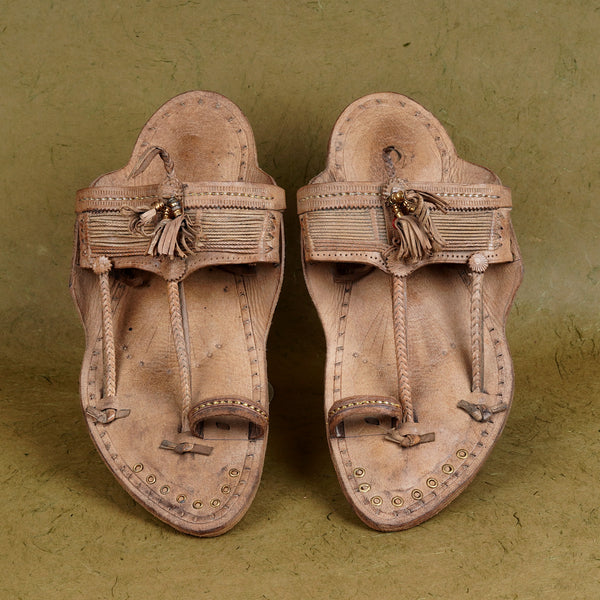 Top angle view men’s authentic Sound Kolhapuri chappal natural leather color, overhead handcrafted kapashi traditional ethnic sound-making comfortable sandal.