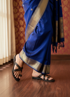 Indian model in traditional saree wearing authentic Kisabai Chepali women’s Kolhapuri chappal, handcrafted leather ethnic flats