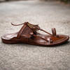 Side view of GI-tagged Kolhapuri chappal for men from wedding collections, hand-stitched leather slippers perfect for sherwani and ethnic outfits.