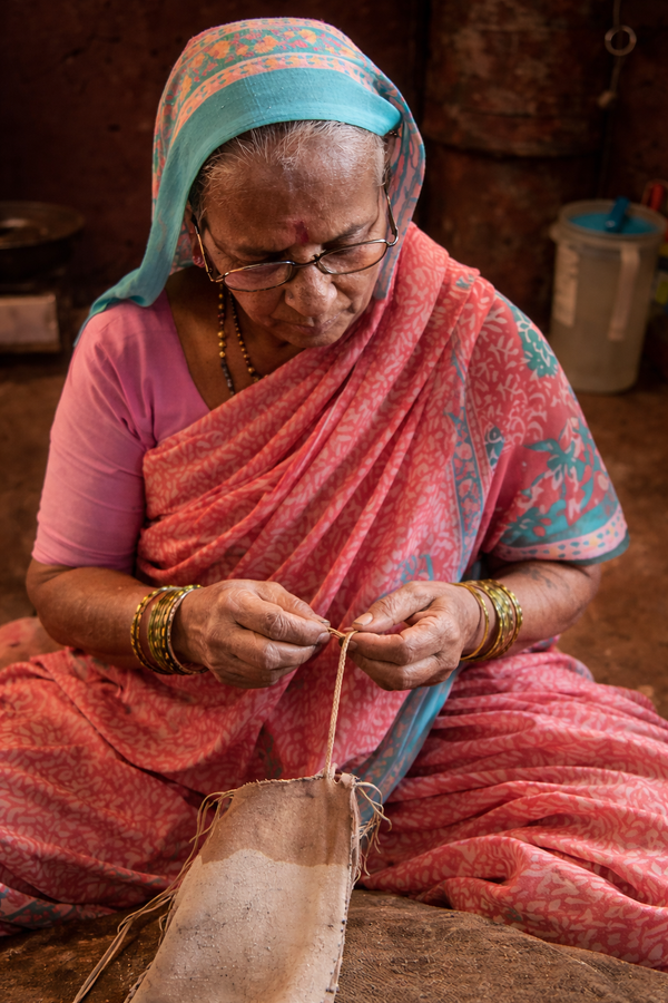 Woman crafting Kolhapuri Chappal