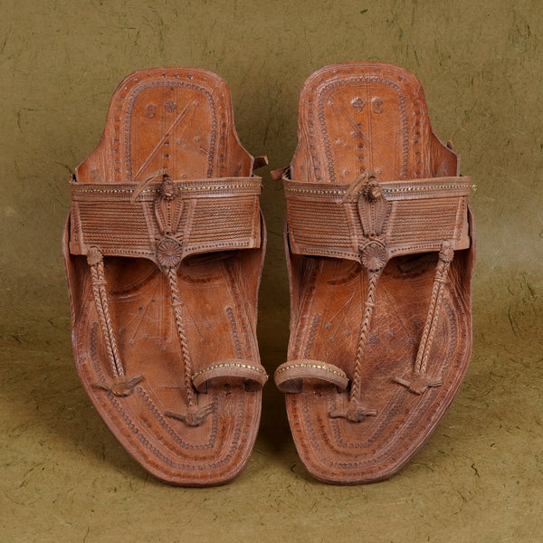 Top angle view men’s original Moja shape Aamdar Kapashi Kolhapuri chappal leather sandal, overhead handcrafted flat-front braided upper traditional ethnic breathable durable artisan footwear.