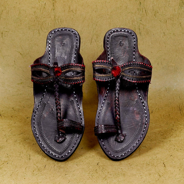 Overhead GI Dola Patta Kolhapuri leather chappal for women top profile, premium vegetable-tanned artisan-stitched heritage graceful footwear.