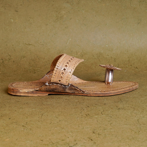 Side angle view women’s authentic Angatha Patta Kolhapuri chappal, handcrafted crossed upper belt leather traditional ethnic comfortable elegant sandal.