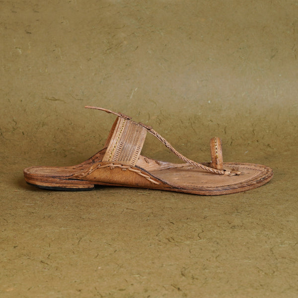 Profile angle authentic Kapashi style women’s Kolhapuri leather sandal, intricate woven detailing traditional comfortable versatile luxury ethnic elegance.