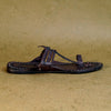 Women’s GI-tagged Triveni Jari Patta Kolhapuri side profile, handcrafted shiny comfortable artisan heritage wedding celebration footwear.