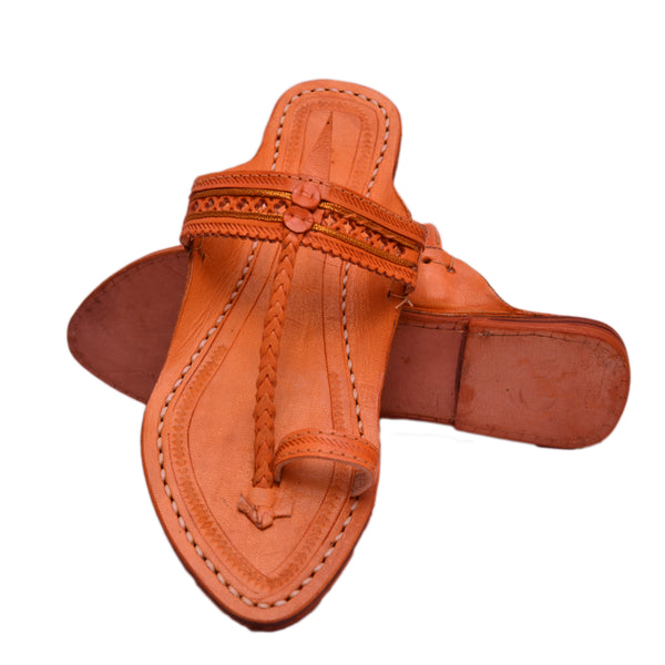 Top angle view women’s authentic Triveni Jari Patta Kolhapuri chappal orange polish, overhead metallic thread leather traditional ethnic festive sandal.