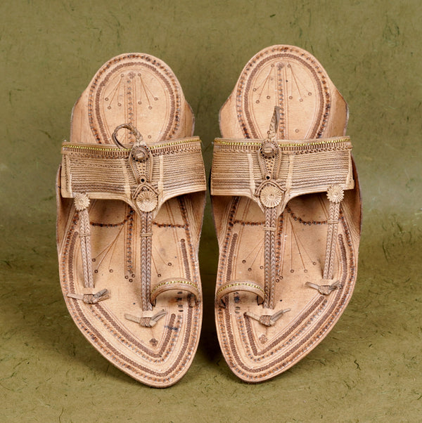 Top angle view men’s original Kapashi Kolhapuri chappal leather sandal slipper dual stitching, overhead detailed paper weave pattern traditional ethnic rugged comfortable versatile footwear.