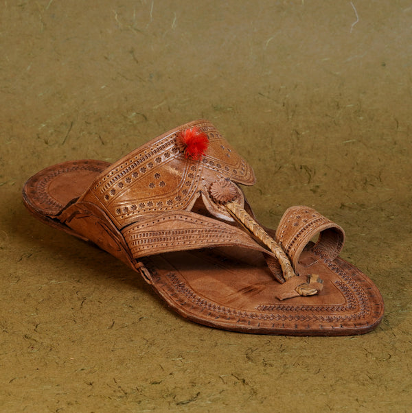 Cross angle view women’s original Chepali Kolhapuri chappal leather sandal slipper, dynamic enveloping strap coverage traditional ethnic flexible comfortable daily ethnic footwear.